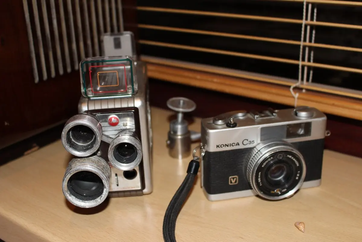 A row of vintage cameras